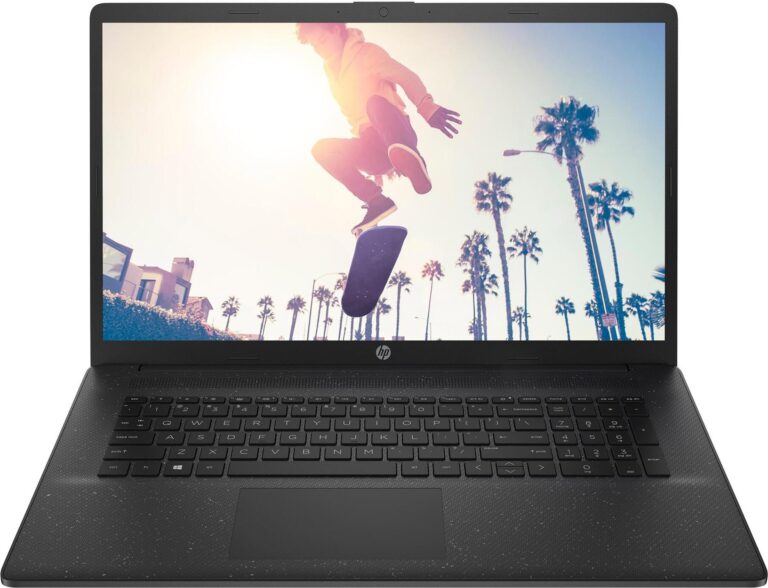 Laptop mit Bild von Skateboarder und Palmen im Sonnenlicht. Laptop mit Bild von Skateboarder und Palmen im Sonnenlicht.